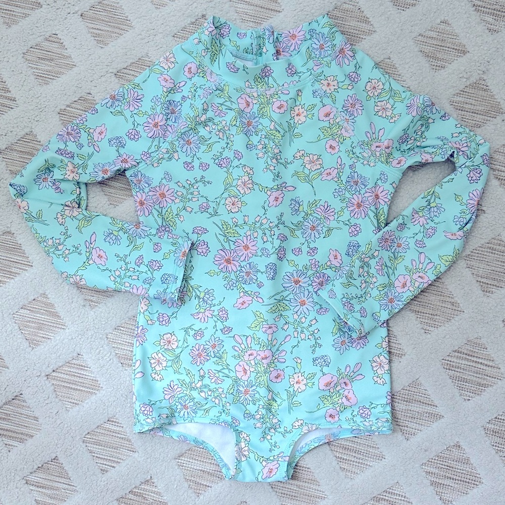 Osh Kosh long-sleeved, child’s swimsuit